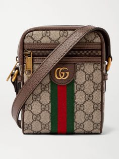 This mini version of Gucci's fan-favourite 'Ophidia' bag is sized to hold your phone, keys and wallet, and is made from protective coated-canvas to keep the contents safe. It's patterned with the brand's monogram and features gold 'GG' hardware at the front. Gucci Dog Collar, Gucci Mens Sneakers, Messenger Bag For Men, Gucci Crossbody Bag, Gucci Ophidia, Gucci Crossbody, Bag Gucci, Canvas Messenger Bag, Gucci Shoulder Bag