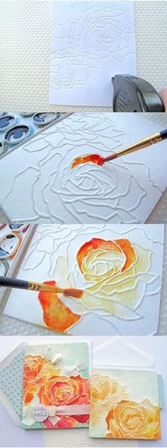 the process of painting flowers on paper with watercolors