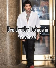 a man walking into an elevator with the words bro decided to age in reverse