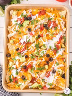 This Chicken Nachos recipe is a quick and easy dish perfect for game day, movie night, or any casual gathering. Layers of chips, cheese, and shredded chicken are baked to perfection and topped with all your favorite toppings.