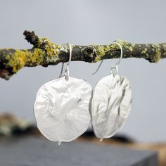 "These sterling silver leaf earrings are made from sterling silver money tree castings. These large, comfortable botanical drop earrings have a natural, organic texture. These gorgeous castings of Lunaria Annua (money tree, or honesty plant) leaves retain all of the detail and texture of the original leaves. The surface of the leaves appears to be slightly folded and creased, just like that of the fresh leaves. I collected these leaves from my back yard and to get them ready to cast, built up th Honesty Plant, Money Tree, Money Trees, Tree Leaves, Large Earrings, Leaf Earrings, Silver Leaf, Natural Organic, Statement Earrings