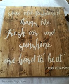 a wooden sign with some writing on it that says, some old fashioned things like fresh air and sunshine are hard to beat