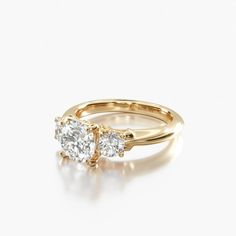 two stone engagement ring set in yellow gold