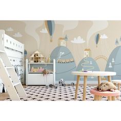 a child's room with a wall mural and play table in the foreground