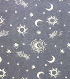 the sun, moon and stars are all over this fabric