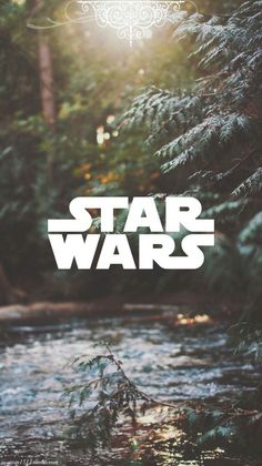 the title for star wars is shown in front of a river with trees and water