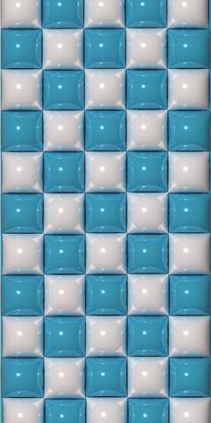 a blue and white tile wall with square shapes