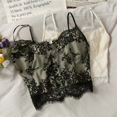 Fringe lace, slim short spaghetti strap top, super fairy lace breasted tank topMaterial:laceColor:black,ivoryFeatures:sweet,laceSize(cm):free 1inch=2.54cmlength:39,bust:70-86Note:Due to different measurement methods,there will be 1-3 error(unite:cm), please understand.&ltbr/>&ltp&gtPlease check the size carefully when you choose items,thank you.</p>&ltbr/> Summer Lace Camisole With Contrast Lace, White Contrast Lace Camisole, White Lace Contrast Camisole, White Camisole With Contrast Lace, White Contrast Lace Cami Camisole, Black Lace Tops For Summer, Black Sleeveless Delicate Lace Top, Sleeveless Lace Camisole With Lace Patchwork, Summer Contrast Lace Camisole Top