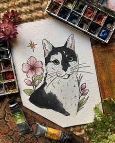 a painting of a black and white cat with flowers