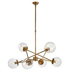 an antique brass chandelier with clear glass globes hanging from the ceiling, isolated against a white background