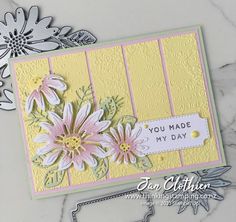 a close up of a card with flowers on it