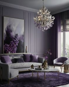 a living room filled with furniture and a chandelier