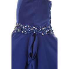 a blue dress with beading on the waist