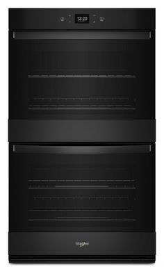 two black ovens side by side on a white background