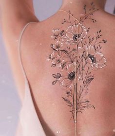 Explore the Elegance of Tattoo For Women  Where Ink Becomes Expression. Tattoo With White Highlights, Ušný Piercing, Floral Creations, Full Back Tattoos, Spine Tattoos For Women, Lily Tattoo, Classy Tattoos, Back Tattoo Women