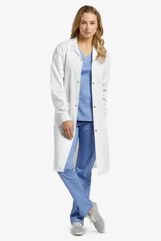 Each White Cross 2068SRB Marvella Unisex 32” Lab Coat features many functional details like rib-knit cuffs for extra comfort and warmth, plenty of pockets, and snaps for easy on-off. The White Cross lab coat collection is every bit comfortable, classic, and professional. Offered in multiple lengths, you’ll be sure to find the perfect one for you. • Unisex fit • Lapel collar • 4 snap closure • Total of 3 pockets • 2 front patch pockets • 1 left chest pocket • Side entry access slits • Long sleeve Women's Lab Coats, Patient Gown, Doctor Coat, White Lab Coat, Fit Scrubs, Koi Scrubs, Doctor Outfit, Great Coat, Lab Coats