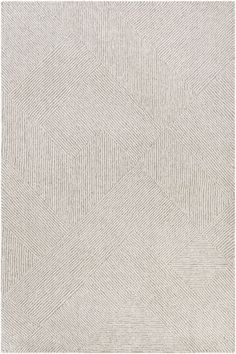 a white rug with an abstract design on the bottom, and a diamond pattern in the middle