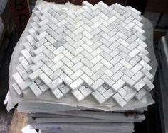 some white tiles stacked on top of each other