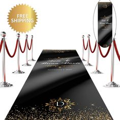 a black carpet with gold glitters and red velvet barriers surrounding it for an award ceremony