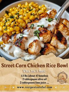 a bowl filled with chicken, corn and rice