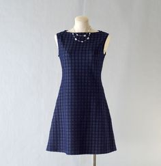 This sleeveless dress is made of a structured poly textured knit with a checkerboard pattern in a dark navy criss cross.   This dress has a nice feel to it, It is a simple A-line dress featuring a back bow that cinches the waist and gives more shape to the silhouette and falls at the knee.   This is the perfect dress for the office, to wear out to brunch, breakfast or dinner.  It's a go to! AND it washes well, no dry cleaner needed Small - Bust 32-34, Waist 25-27, Hips 33-36 Medium - Bust 36-38, Aline Dress Pattern, Business Casual Clothes, Casual Clothes For Women, Women Business Casual, Office Attire Women, Happy Dresses, Bold Dresses, Dresses Cute, Business Casual Outfits For Women