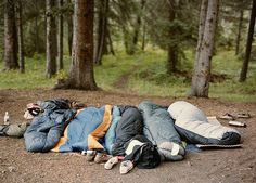 there are many sleeping bags on the ground