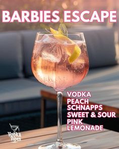 an advertisement for a pink lemonade drink on a table with the words barbies escape