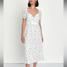 Size Large And Never Worn! Unfortunately It Didn’t Fit Me Right And I Am Sad Because It Is So Beautiful Elegant White Midi Dress With Ditsy Floral Print, White Midi Dress With Ditsy Floral Print, White Knee-length Midi Dress With Ditsy Floral Print, Elegant White Ditsy Floral Print Dress, White Elegant Dress With Ditsy Floral Print, Casual White Midi Dress With Ditsy Floral Print, Fitted White Midi Dress With Ditsy Floral Print, Chic White Midi Dress With Ditsy Floral Print, White Ditsy Floral Print Dress With Puff Sleeves