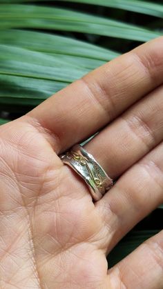 Silver And Gold Ring, Wedding Ring Band, Handcrafted Ring This handcrafted rustic ring band is simply beautiful! The wide textured Sterling Silver ring is inspired by Pre-Colombian jewellery; it is entirely handcrafted and is decorated with a yellow gold pattern. * Material: Hallmarked Sterling Silver & 18ct Solid Yellow Eco Gold * Dimensions: Approx 10mm (0.39in) Wide & 1.5mm (0.05in) thick * Ready to Ship in 10 business Days * Made in the United kingdom * Ring Size: Please select your Heirloom Adjustable Toe Rings, Adjustable Heirloom Toe Ring, Stackable Wide Band Open Ring For Wedding, Bohemian Stackable Open Rings For Wedding, Bohemian Open Stackable Rings For Wedding, Hand Forged Wide Band Ring For Anniversary, Hand Forged Wide Band Open Ring For Anniversary, Hand Forged Open Band Ring For Gift, Hand Forged Open Band Ring As Gift