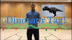 a man standing on top of a basketball court in front of an image of a dinosaur