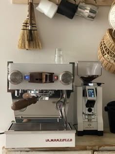 an espresso machine sitting on top of a counter