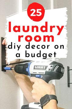 a man using a power drill to fix a door with the words 25 laundry room diy decor on a budget