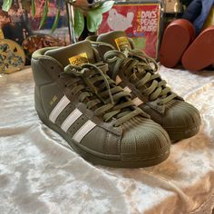 Super Cool Army Green Pro Model Adidas. Mid Top. Never Worn Like New Condition. Men’s 4 Women’s 6. #Sneakers #Streetwear #Hiphop #Casual #Blokecore #Athleisure Adidas Mid, Adidas Pro Model, Green Pro, Green Adidas, Mid Top Sneakers, Mid Top, Super Cool, Adidas Women, Womens Shoes Sneakers