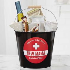 a new mama survival kit in a bucket