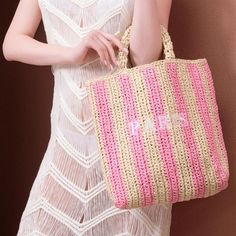 This gorgeous little beach / summer bag will be your go-to! It is perfect for the Spring and Summer seasons as it can easily transition from morning beach bag to evening sushi date bag! Lightweight wicker-like fabric in an interweaving pattern with pink stripes and PARIS letters stitched on the front. Sushi Date, Morning Beach, Straw Tote Bag, Wicker Bags, Bedroom Gift, Summer Bag, Straw Tote, Pink Stripes, Summer Season