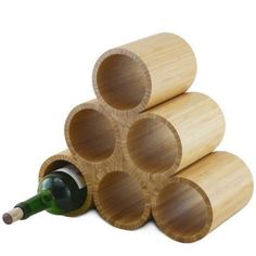 a wine rack with six bottles in it