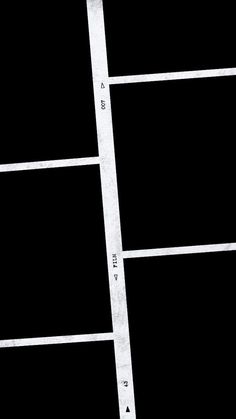 a black and white photo of a street sign