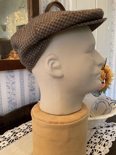 Made by Ascot Caps, this newsboy hat is 40 per cent wool, 55 per cent polyester and 5 per cent other fibres, in classic shades of light moss green, light brown and dark brown. The hat has one snap on the brim. It is fully lined with rusty brown fabric lining. Fits men's size 7 1/8. In very good condition. Fitted Casual Felt Hat Flat Cap, Fitted Casual Felt Flat Cap, Fitted Cap Beret For Fall, Fitted Fall Beret Cap, Classic Winter Beret, Classic Felt Cap For Winter, Classic Brown Beret For Fall, Classic Winter Felt Cap, Retro Brown Beret For Fall