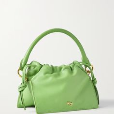 Yuzefi's 'Bom' Tote Has A Structured, Inverted Shape That's So Eye-Catching And Cool. It Has Been Handmade In Spain From Lime-Green Leather And Has A Drawstring Top To Keep Your Belongings Secure - Though Mini, It's Spacious Enough To Hold A Large Phone. Attach The Shoulder Strap To Wear It Cross-Body. Handle Drop: 8cm / 3.1in Depth: 10cm / 3.9in Max. Strap Length: 113cm / 44.5in Height: 14cm / 5.5in Width: 18cm / 7.1in Lime-Green Leather (Cow) Drawstring Top Designer Color: Apple Comes With Dus Apres Ski Wear, Socks And Loafers, Green Handbag, Leather Outerwear, Fashion Trends Winter, Drawstring Top, Trainer Boots, Cold Weather Accessories, Platform Boots