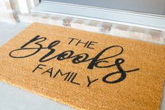 a door mat with the words, the brook family written on it in black ink