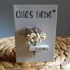 a card with a bouquet of flowers on it that says rues riebe