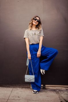 Navy Blue Satin Pants Outfit, Blue Long Pants Outfit, Bright Blue Pants Outfit Women, Royal Blue Wide Leg Pants Outfit, Blue Silk Pants Outfit, Blue Flowy Pants Outfit, Royal Blue Slacks Outfit Women, Coloured Pants Outfits, Wide Leg Pants Sneakers Outfit