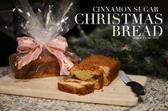 a loaf of cinnamon sugar christmas bread on a cutting board