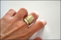 A unique, wide, folded ring, so simple and minimalist that you can wear it everyday. ❤️  This ring is made of metal sheet which is hand-cut, brushed and polished to a matte/brushed finish. ★ AVAILABLE MATERIALS :    - German silver    - Brass    - 18K Gold Plated brass    - Copper    -  Sterling silver.925  ★ MAXIMUM WIDTH :  2cm / 0.8 inches ★ S I Z E : A little adjustable, but please choose your US size so that it fits better to you.  I can make it with more or less thick metal, in order to be Anel Tutorial, Gold Ring Unique, Everyday Ring, Simple Ring, Geometric Ring, Ring Simple, Everyday Rings, Modern Ring, Ring Minimalist