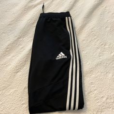 Never Worn. In Great Condition! Stretch Black Sweatpants With Three Stripes, Black Stretch Sweatpants With Three Stripes, Adidas Black Bottoms With Side Stripes, Adidas Black Sweatpants With Three Stripes, Adidas Sporty Black Bottoms, Adidas Black Sporty Pants, Sporty Black Adidas Bottoms, Pants Adidas, Adidas Pants