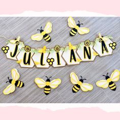 decorated cookies with the name juliana and bees on them for a bee themed birthday party