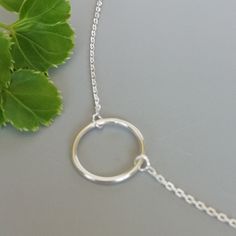 "A Sterling silver neck chain with a circle charm. Dimensions: Circle: 14.5 mm Length: 16 to 18\" This necklace is made of 925 hypoallergenic sterling silver. Most of my pieces come with a 925 stamp. Please go through all the pictures posted for this item to gauge the actual size. Can be packaged in a gift box. I can include a personal message from you if needed You are welcome to contact me at... bhavnakwintra1956@gmail.com For more beautiful pieces from my shop, please browse 👇 TOE RINGS: htt Minimalist Silver Chain Charm Necklace, Adjustable, Adjustable Minimalist Charm Necklace With Silver Chain, Minimalist Circle Sterling Silver Charm Necklace, Circle Charm Necklace, Necklace Minimalist Jewelry, Necklace Circle, Necklace Simple, Necklace Minimalist, Neck Chain