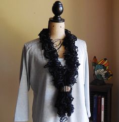 This is knitted black scarf/necklace with beaded ring. Ring can be removed and it can be worn as scarf. Elegant and unique. Great gift idea. Black Crochet Bohemian Jewelry, Black Bohemian Crochet Jewelry, Chunky Scarf, Modern Necklace, Scarf Necklace, Chunky Scarves, Beaded Ring, Palm Coast, Stil Elegant