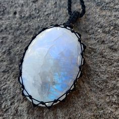 Beautiful handmade Macrame iridescent Rainbow Moonstone crystal pendant, with an adjustable black necklace cord. Rainbow Moonstone has a highly spiritual nature that is said to assist women in recognizing and embracing their innate personal power. It is known to encourage fervent desires, eager expectations, and heartfelt resolve and to balance the masculine-feminine vibrations within your body. This necklace is a unique creation that will shine the uniqueness within you! It can be a great gift Adjustable Crystal Necklace With Large Stone In Spiritual Style, Adjustable Spiritual Crystal Necklace With Large Stone, Mystical Adjustable Moonstone Crystal Necklaces, Adjustable Mystical Moonstone Crystal Necklace, Adjustable Moonstone Crystal Necklaces For Meditation, Adjustable Spiritual Moonstone Crystal Necklace, Rutilated Quartz Jewelry, Moonstone Necklace Silver, Spiritual Nature