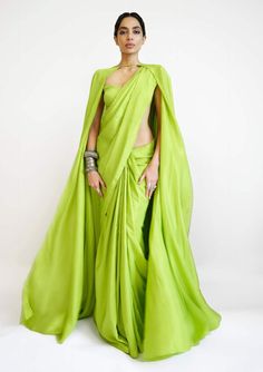 Ekaya-Lime Green Silk Sari-INDIASPOPUP.COM Luxury Designer Pre-draped Saree In Pista Green, Luxury Unstitched Pista Green Blouse, Luxury Pista Green Saree With Traditional Drape, Luxury Green Pre-draped Saree For Summer, Luxury Green Pre-draped Saree For Diwali, Luxury Fitted Green Saree, Luxury Green Bollywood Style Saree, Cheap Green Pre-draped Saree For Festivals, Luxury Pista Green Elegant Blouse